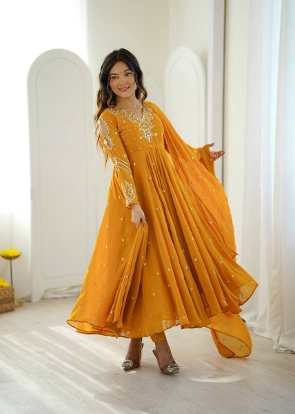 Mesmerizing Yellow Faux Georgette Gown Pant Dupatta Set with 7 Meter Flair for Reseller Ready To Wear Collection