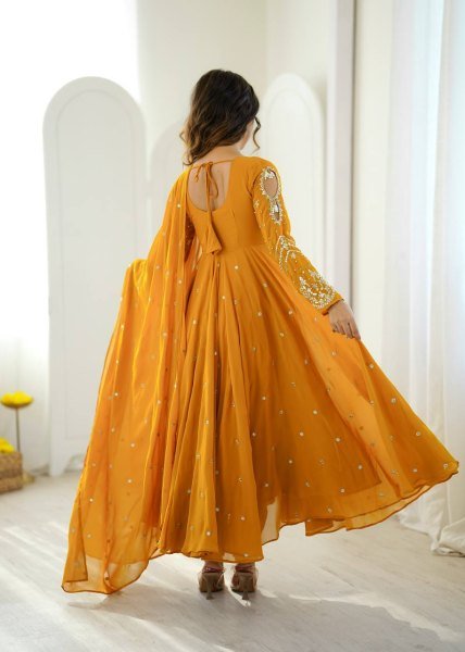 Mesmerizing Yellow Faux Georgette Gown Pant Dupatta Set with 7 Meter Flair for Reseller Ready To Wear Collection