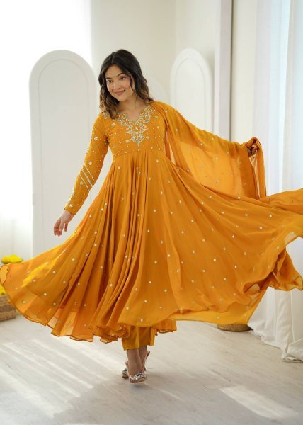 Mesmerizing Yellow Faux Georgette Gown Pant Dupatta Set with 7 Meter Flair for Reseller Ready To Wear Collection