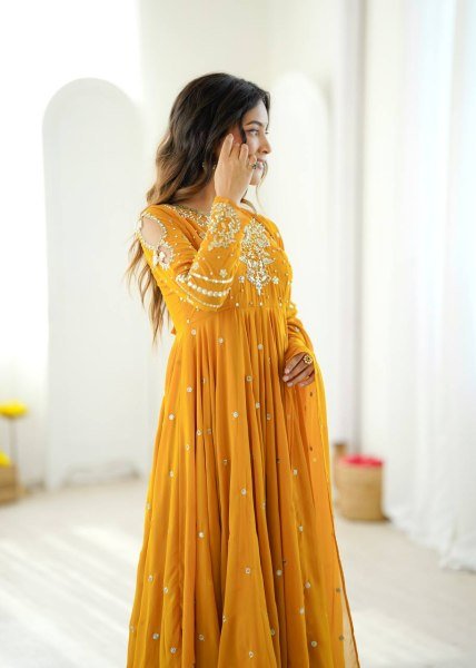 Mesmerizing Yellow Faux Georgette Gown Pant Dupatta Set with 7 Meter Flair for Reseller Ready To Wear Collection