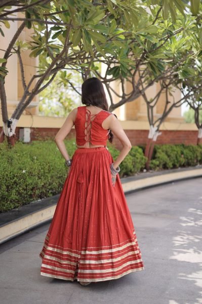 Modern Orange Reyon Chaniya Choli with Sleeveless Blouse For Dandiya Night Navratri Lehnega Choli