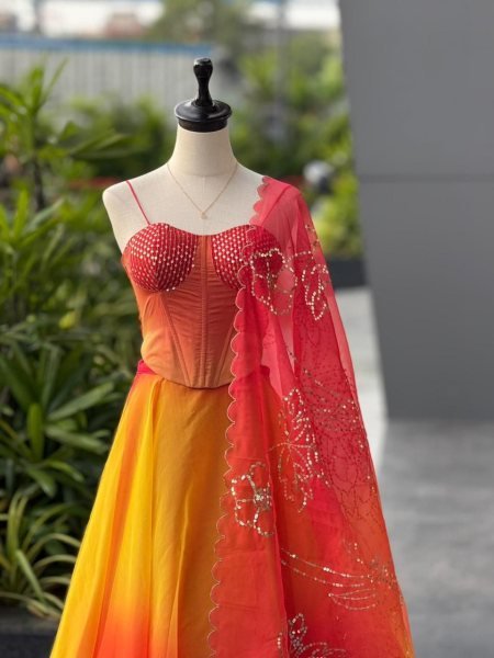 Modern Orange Corset Style Lehenga Choli with Organza Fabric for Party Wear Designer Lehenga Choli