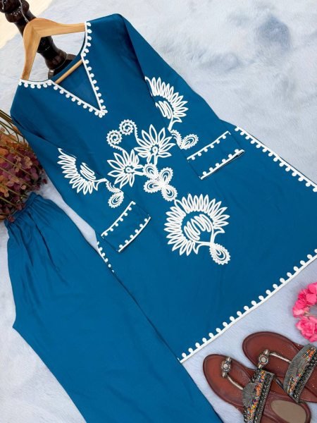 Nupur Sanon Wearing Teal Blue Cotton Embroidered Kurta with Notch Neckline CO ORD Sets