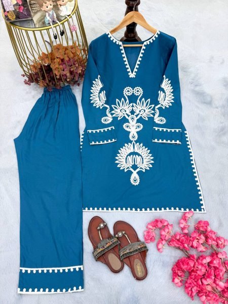 Nupur Sanon Wearing Teal Blue Cotton Embroidered Kurta with Notch Neckline CO ORD Sets