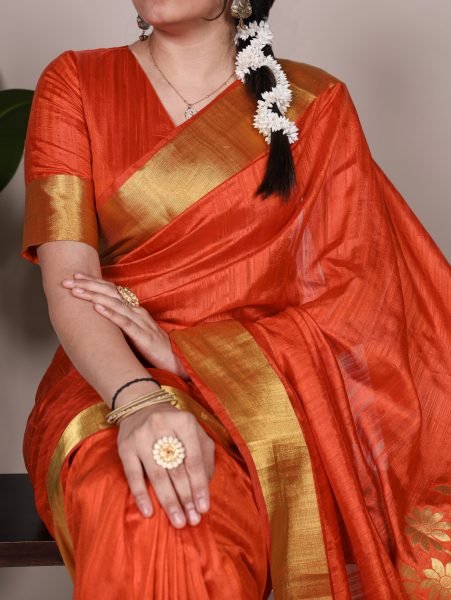 Orange Designer Raw Silk Saree with Rich Zari Weaving Perfect for Weddings Silk Sarees Wholesale