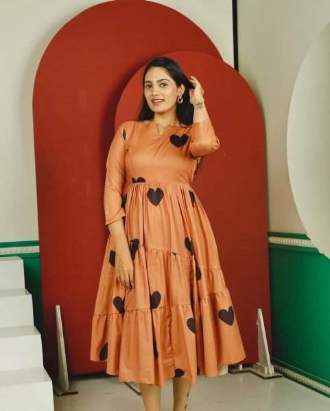 Plush Orange Elegant Parampara Cotton Flared Gown for Daily and Festive Wear Western Ladies Top Wholesale
