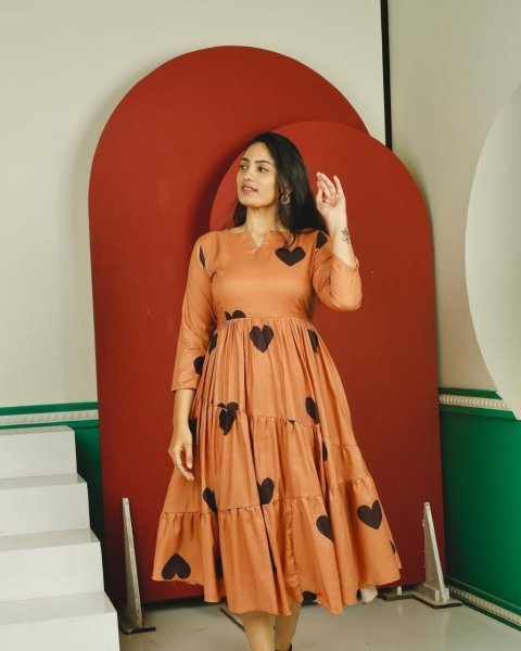 Plush Orange Elegant Parampara Cotton Flared Gown for Daily and Festive Wear Western Ladies Top Wholesale