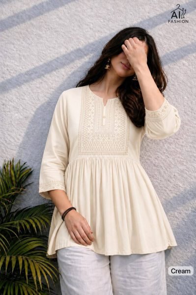 Portable Cream Heavy Rayon Short Tunic with Embroidery and Beads Work at Wholesale Rate Tunics kurti