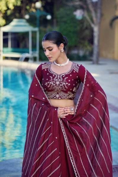 Radiant Maroon Rangoli Crush Lehenga Choli with Sequins Belt and Dupatta At Wholesale  Designer Lehenga Choli