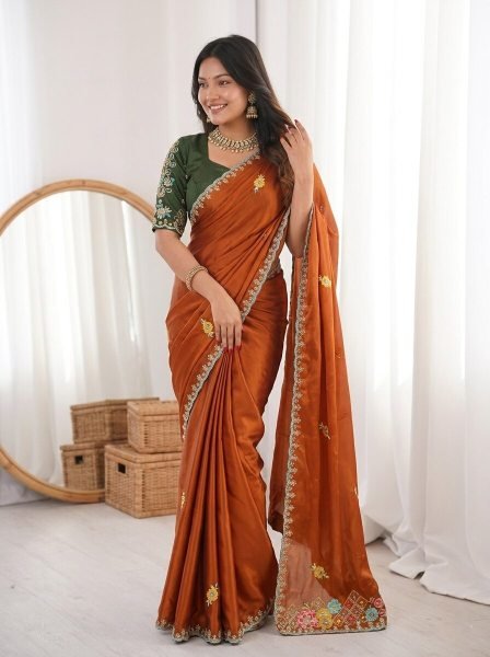Radiant Orange Rangoli Silk Saree with Cutwork Border for Women at Best Price Silk Sarees Wholesale