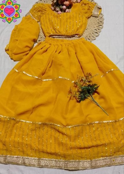 Radiant Yellow Haldi Special Embroidered Gown Set with Ruffle Flair  Girls Wear