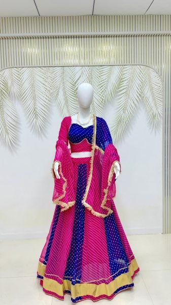 Rani Pink Blue Heavy Faux Georgette Bandhej Print Lehenga Choli with Lace Work at Wholesale Navratri Lehnega Choli
