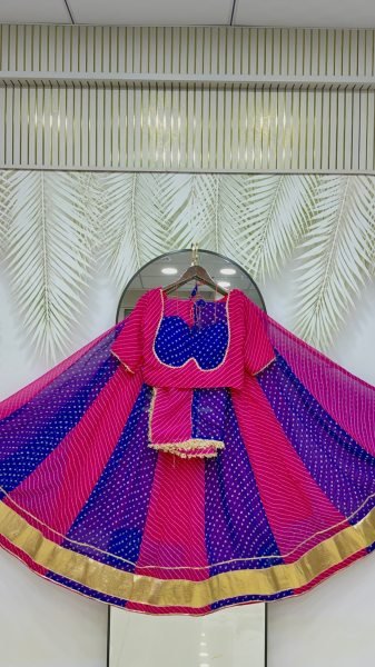 Rani Pink Blue Heavy Faux Georgette Bandhej Print Lehenga Choli with Lace Work at Wholesale Navratri Lehnega Choli