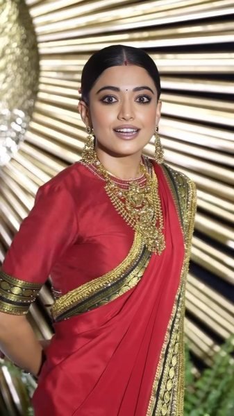 Rashmika Mandanna Wearing  Traditional Red Crepe Silk Saree With a Black Border Silk Sarees Wholesale