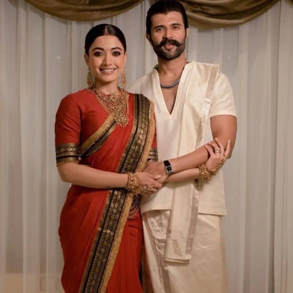 Rashmika Mandanna Wearing  Traditional Red Crepe Silk Saree With a Black Border Silk Sarees Wholesale