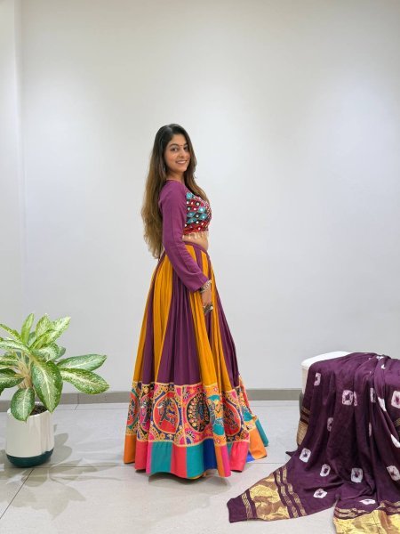 Refined Wine Yellow Rayon Lehenga Choli with Real Mirror Work and Bandhni Dupatta Navratri Lehnega Choli
