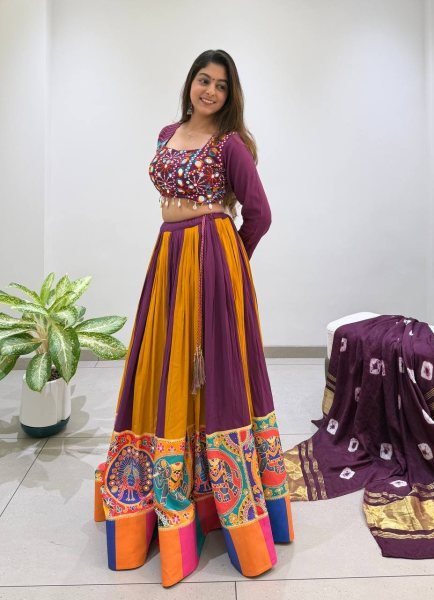 Refined Wine Yellow Rayon Lehenga Choli with Real Mirror Work and Bandhni Dupatta Navratri Lehnega Choli