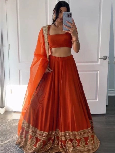 Revolutionary Orange Faux Georgette Lehenga Choli with Zari Sequins Embroidery for Wedding Wear  Lehenga