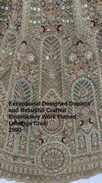 Rich Pista Embroidered Lehenga Choli for Bride and Reception Wear Bridal Lehenga Choli