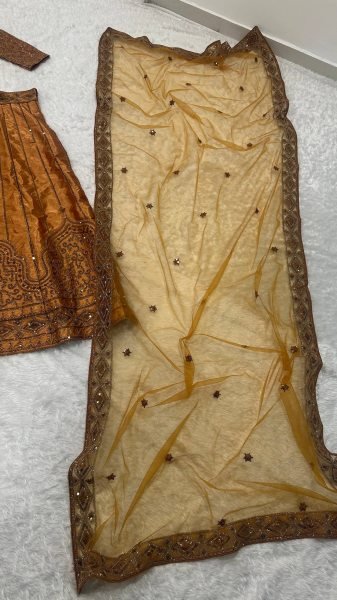 Rust Wedding Wear Satin Silk Lehenga Choli with Net Embroidered Dupatta at Wholesale Rate Designer Lehenga Choli