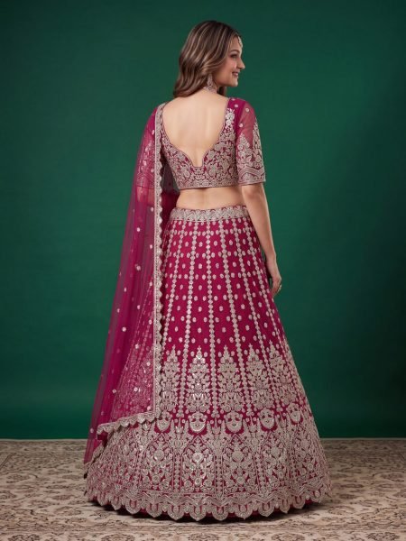 Sleek Rani Pink Bridal Soft Net Lehenga with Zari Dori and Sequins Embroidery Bridal Lehenga Choli