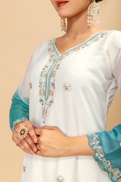 Sleek Turquoise Collection with Premium Georgette Kurti and Embroidered Zari Weaving Dupatta Ready To Wear Collection
