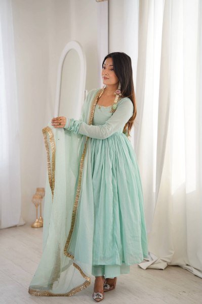 Soft Touch Aqua Green Faux Fabric Gown with 5 Meter Flair and Lace Border Dupatta Ready To Wear Collection