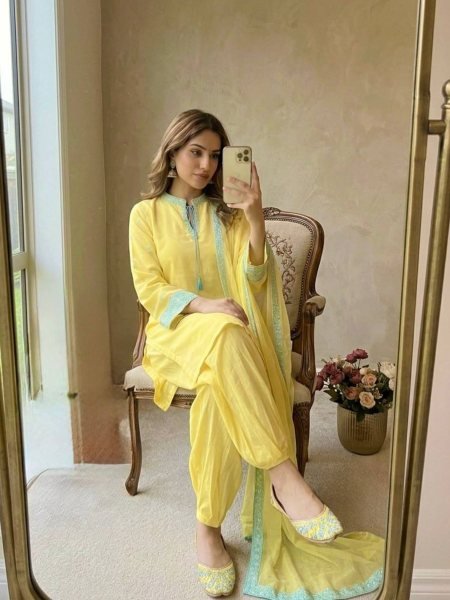 Sophisticated Yellow Crepe Silk Embroidered Top with Belly Sleeves Tassels Balloon Pants With Dupatta Ready To Wear Suit