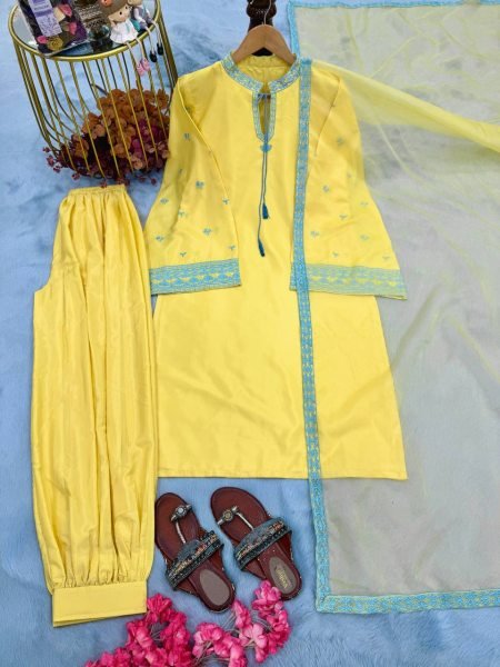 Sophisticated Yellow Crepe Silk Embroidered Top with Belly Sleeves Tassels Balloon Pants With Dupatta Ready To Wear Collection