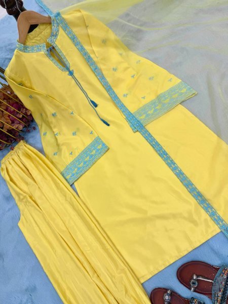Sophisticated Yellow Crepe Silk Embroidered Top with Belly Sleeves Tassels Balloon Pants With Dupatta Ready To Wear Collection
