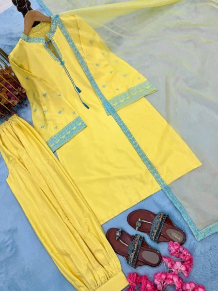 Sophisticated Yellow Crepe Silk Embroidered Top with Belly Sleeves Tassels Balloon Pants With Dupatta Ready To Wear Collection