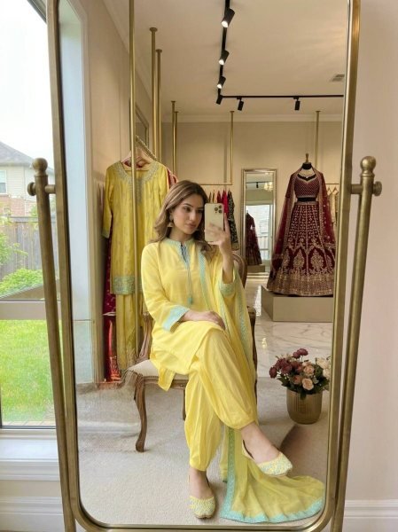 Sophisticated Yellow Crepe Silk Embroidered Top with Belly Sleeves Tassels Balloon Pants With Dupatta Ready To Wear Collection