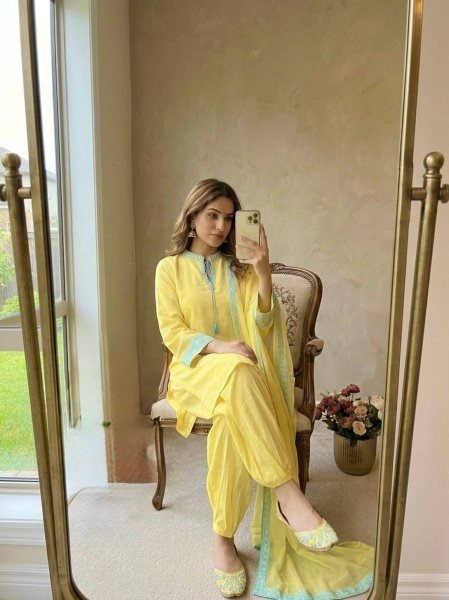 Sophisticated Yellow Crepe Silk Embroidered Top with Belly Sleeves Tassels Balloon Pants With Dupatta Ready To Wear Collection
