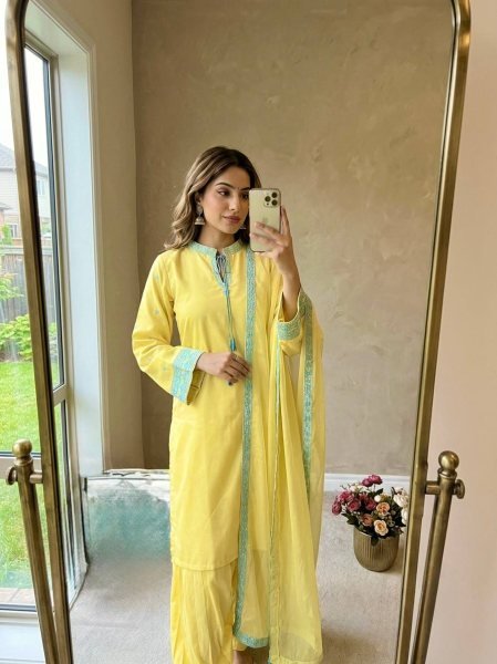 Sophisticated Yellow Crepe Silk Embroidered Top with Belly Sleeves Tassels Balloon Pants With Dupatta Ready To Wear Collection