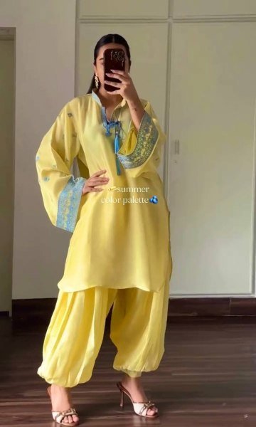 Sophisticated Yellow Crepe Silk Embroidered Top with Belly Sleeves Tassels Balloon Pants With Dupatta Ready To Wear Collection