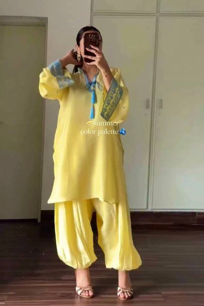 Sophisticated Yellow Crepe Silk Embroidered Top with Belly Sleeves Tassels Balloon Pants With Dupatta Ready To Wear Collection