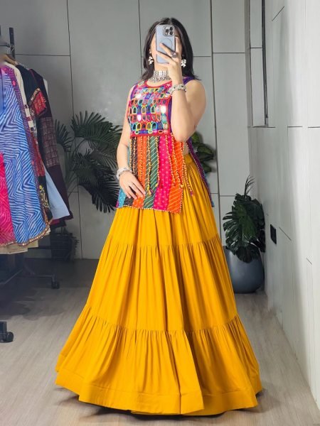 Stunning Yellow Rayon Chaniya Choli with Mirror Work and Latkan Dori for Women Navratri Lehnega Choli