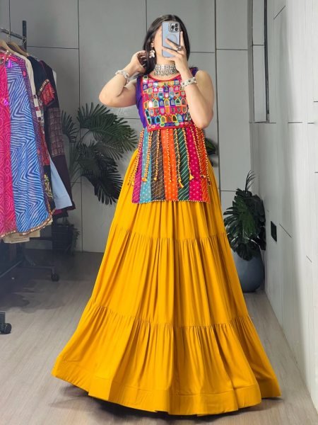 Stunning Yellow Rayon Chaniya Choli with Mirror Work and Latkan Dori for Women Navratri Lehnega Choli