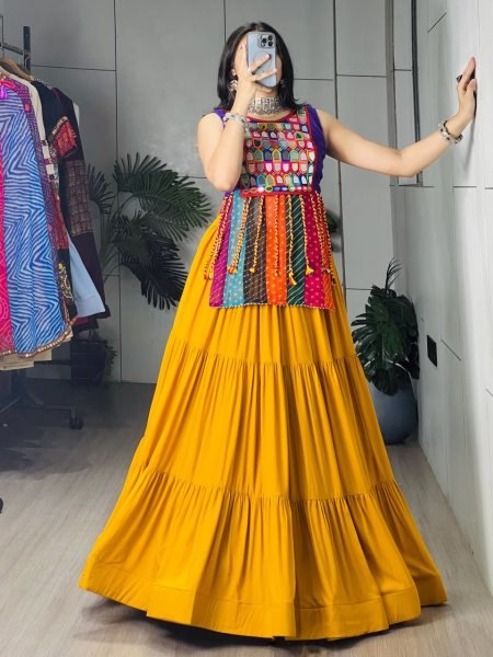 Stunning Yellow Rayon Chaniya Choli with Mirror Work and Latkan Dori for Women Navratri Lehnega Choli