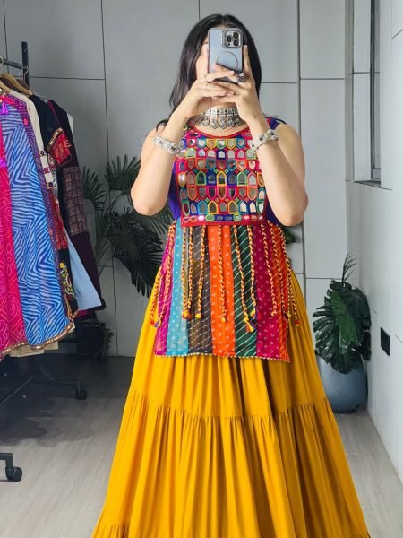 Stunning Yellow Rayon Chaniya Choli with Mirror Work and Latkan Dori for Women Navratri Lehnega Choli