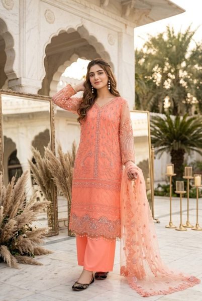 Transformative Peach Heavy Soft Net Embroidered Kurti Palazzo Set with Pearl Hand Work Ready To Wear Collection