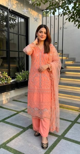 Transformative Peach Heavy Soft Net Embroidered Kurti Palazzo Set with Pearl Hand Work Ready To Wear Collection