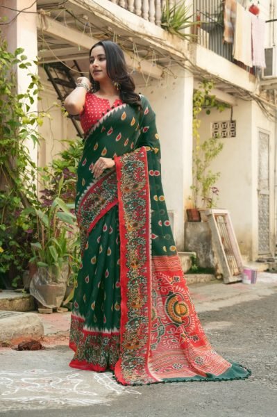 Trendy Green Red Mul Mul Cotton Ikkat Print Saree with Pom Pom Border For Festival  Printed Cotton Sarees Wholesale
