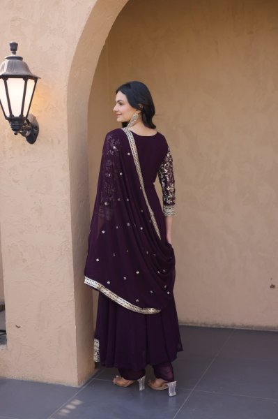 Unbeatable Wine Blooming Zari And Squences Work in Gwon set With Designer Lace Border  Ready To Wear Collection