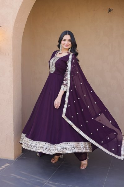 Unbeatable Wine Blooming Zari And Squences Work in Gwon set With Designer Lace Border  Ready To Wear Collection