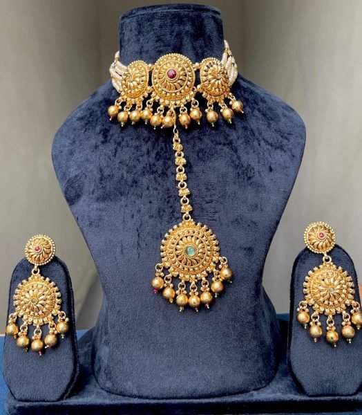 Unparalleled Gold Plated Matte Necklace Set with Earrings and Maang Tikka Fashion Accessories Wholesale
