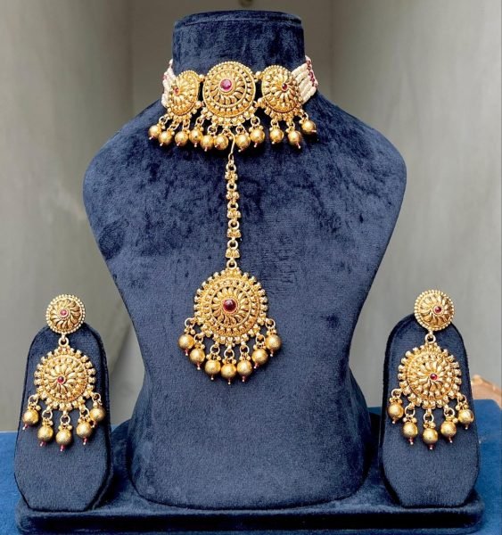 Unparalleled Gold Plated Matte Necklace Set with Earrings and Maang Tikka Fashion Accessories Wholesale