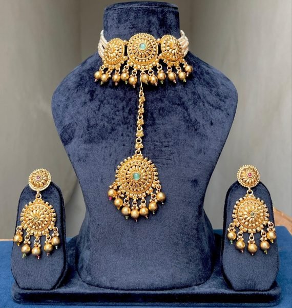Unparalleled Gold Plated Matte Necklace Set with Earrings and Maang Tikka Fashion Accessories Wholesale