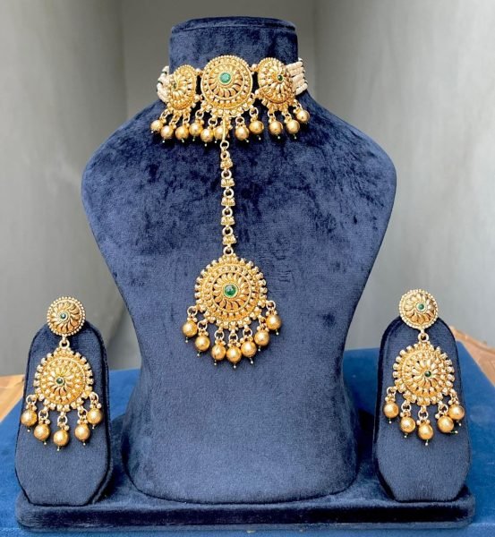 Unparalleled Gold Plated Matte Necklace Set with Earrings and Maang Tikka Fashion Accessories Wholesale
