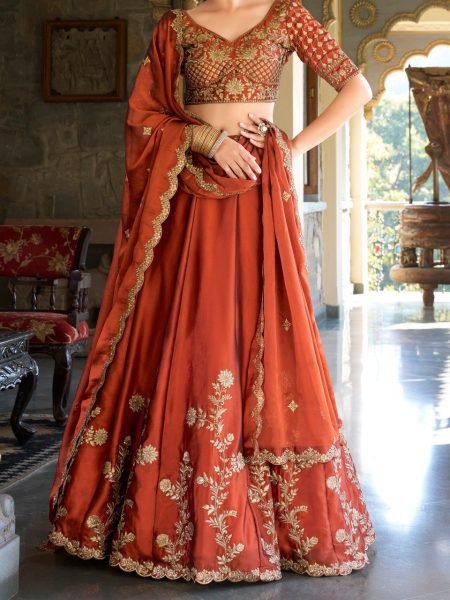 Upscale Rust Orange Rangoli Silk Lehenga Choli With Gold Thread And Sequin Embroidery Designer Lehenga Choli